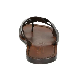 Handmade brown leather thongs braid around the big toe and leather sole