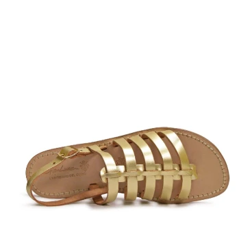 Oro sandalias planas en cuero hecho a mano en Italia
