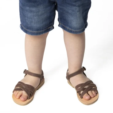 Sandali intrecciati gladiatore da bambino in pelle nubuck marrone chiusura con fibbia