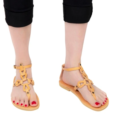 Women's thong sandals with handmade crossed laces in nude calfskin
