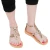 Sandali infradito da donna con lacci incrociati fatti a mano in pelle di vitello laminata oro